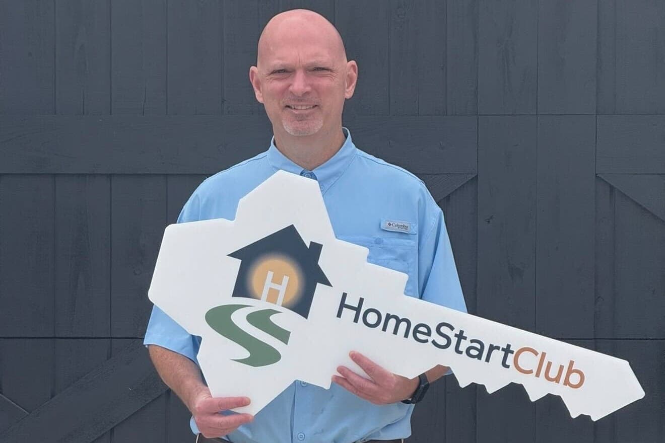Holding the HomeStart Club key on closing day